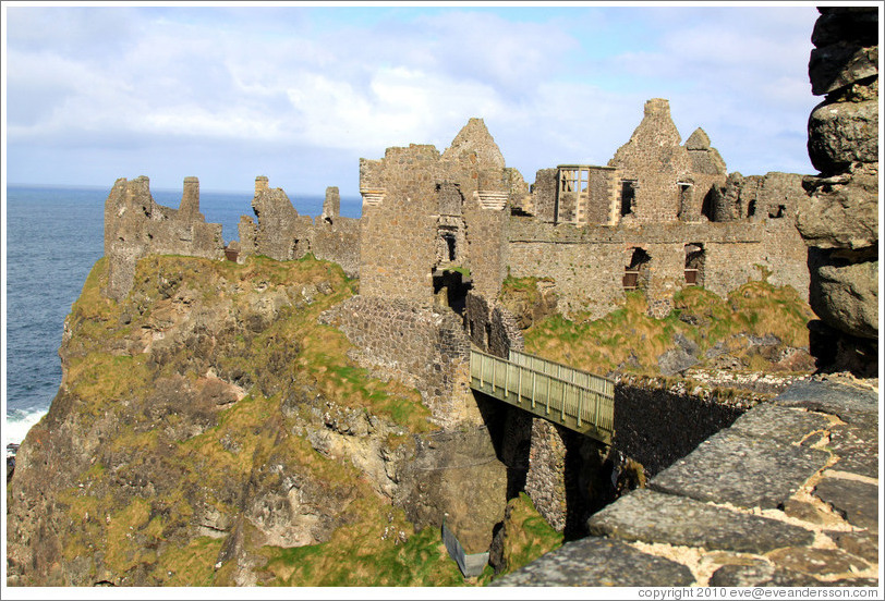 Dunluce Castle on a sea cliff.