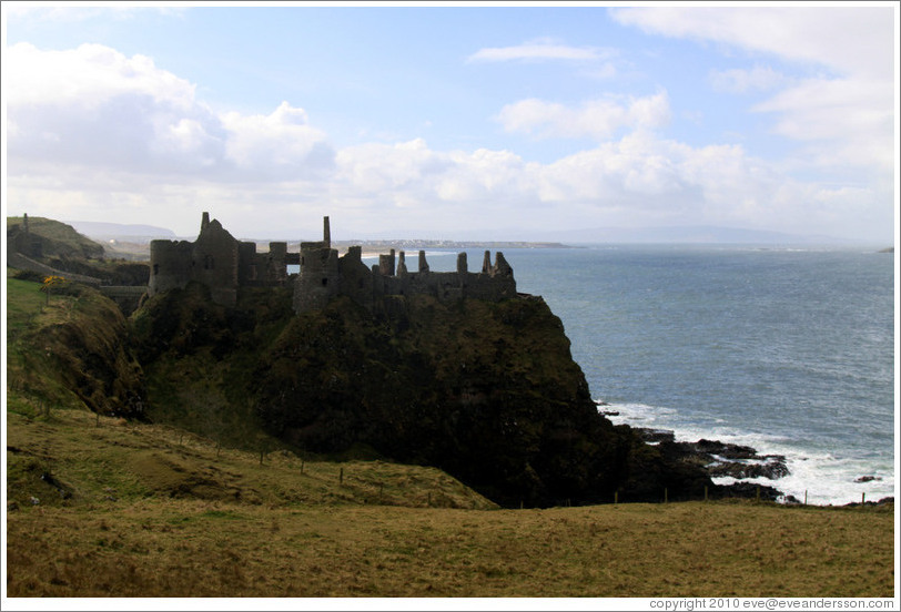 Dunluce Castle on a sea cliff.