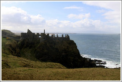 Dunluce Castle on a sea cliff.