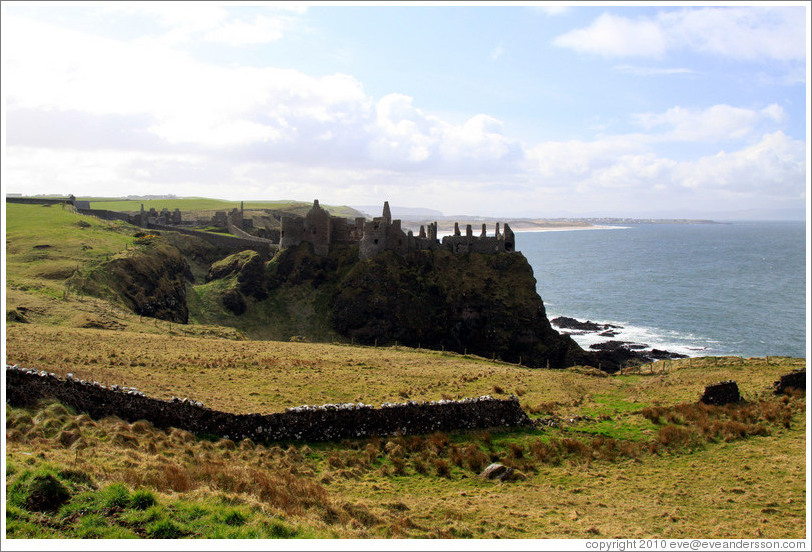 Dunluce Castle on a sea cliff.