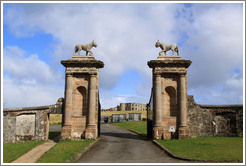 Lion's Gate which are actually adorned by Ounces -- heraldic beasts similar to lynxes or leopards -- rather than lions.  Grounds of the Mussenden Temple.