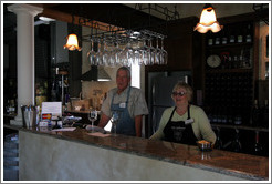 Candice and Richard Dixon in tasting room.  Les Ch&ecirc;nes Estate Vineyards.