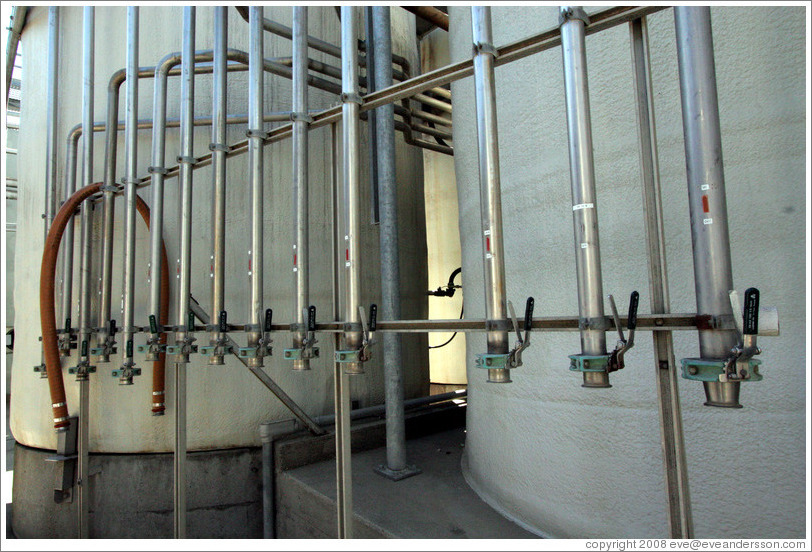 Spouts from fermentation tanks.  Wente Vineyards Estate Winery.