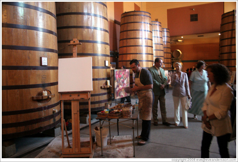 Jim Stallings, Artist in Residence at Clos Pegase Winery, with his artwork.