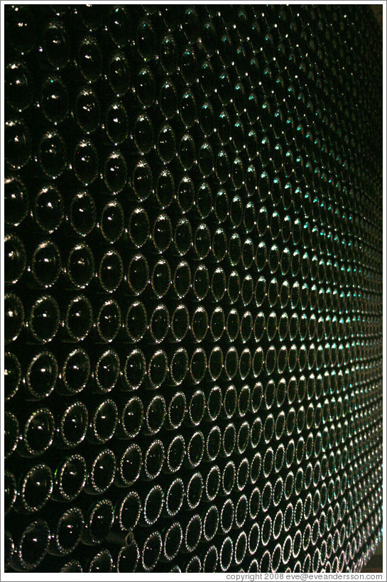 Wall of green bottles.  Domaine Chandon Winery.