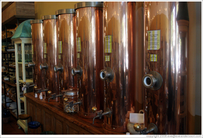 Copper vats containing olive oil for tasting and mixing.  Olivier.