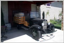 Old car with barrels.  Calcareous Vineyard.