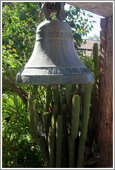Bell in garden.  San Juan Bautista Mission.