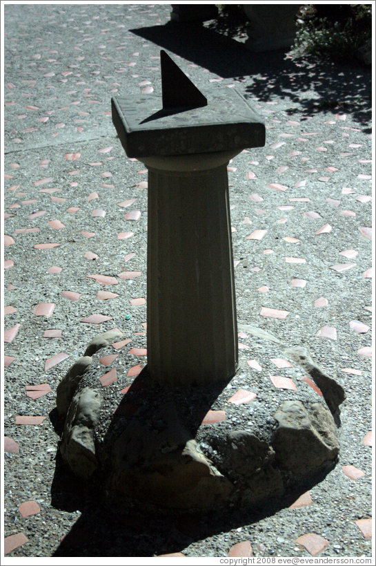 Sun dial in garden.  San Juan Bautista Mission.