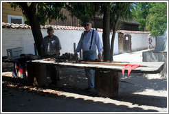 Guides demonstrating weapons and uniforms used by 19th century Mexican army troops.  Sonoma Barracks.