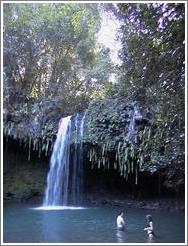 Jin and Beth play in the waterfall. Road to Hana, Maui. 