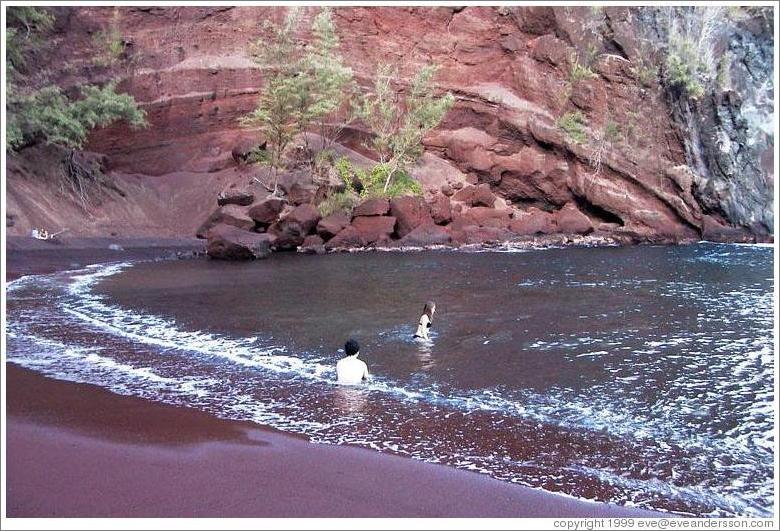 Red sand beach. Jin and Beth in water.  Hana, Maui. 