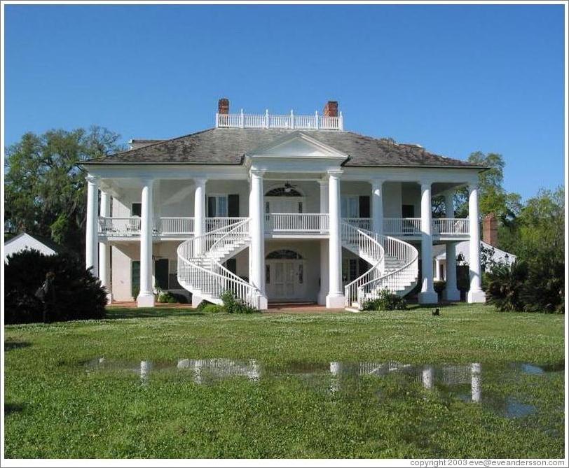 Evergreen Plantation. Notice the water in the yard. New Orleans was built on marshes, and a difference in height of just a few inches can mean wet soil or dry soil.