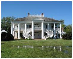 Evergreen Plantation.  Notice the water in the yard.  New Orleans was built on marshes, and a difference in height of just a few inches can mean wet soil or dry soil.