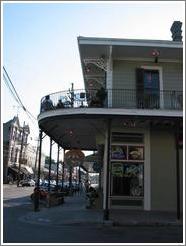 Garden district.  Magazine street.  Bar with balcony.