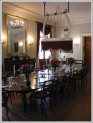 Oak Alley Plantation.  The structure over the dining table is a huge fan, operated by pulling on a string near the wall.