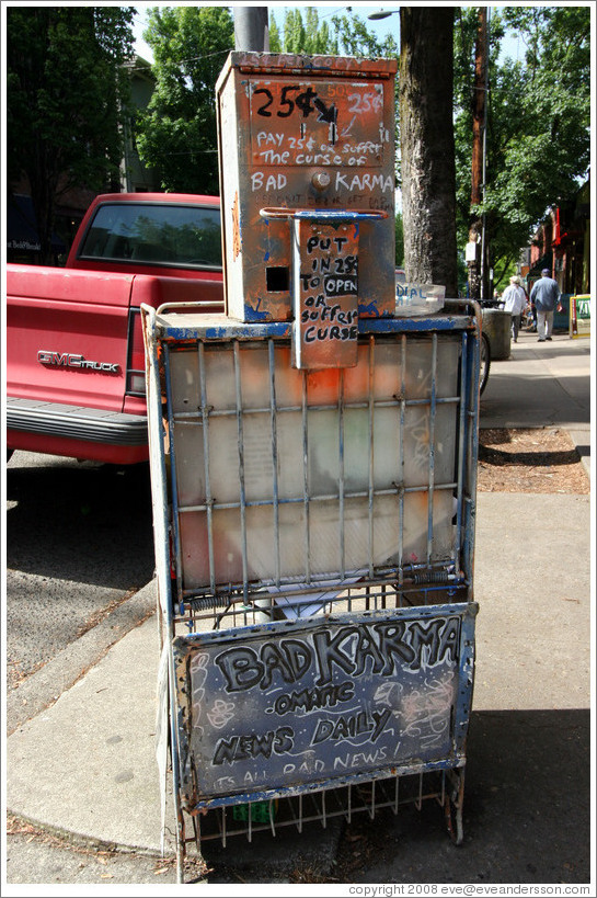 Newspaper vending machine with Bad Karma graffiti.  Hoyt St. and 23rd Ave.  Alphabet District.