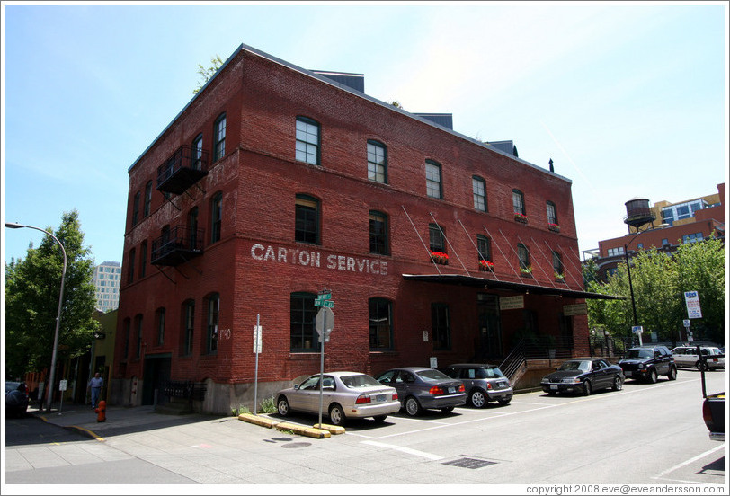 Old brick building with Carton Service painted on it.  13th Ave. and Hoyt St., Pearl District.