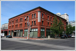 Old brick building with Biltmore Hotel painted on it. Everett St. and 6th Ave., Pearl District.