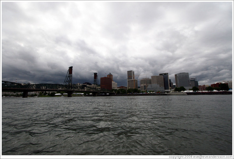 Portland skyline with Hawthorne Bridge, viewed from Willamette River.