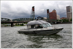 Sheriff boat in front of Hawthorne Bridge, Willamette River.