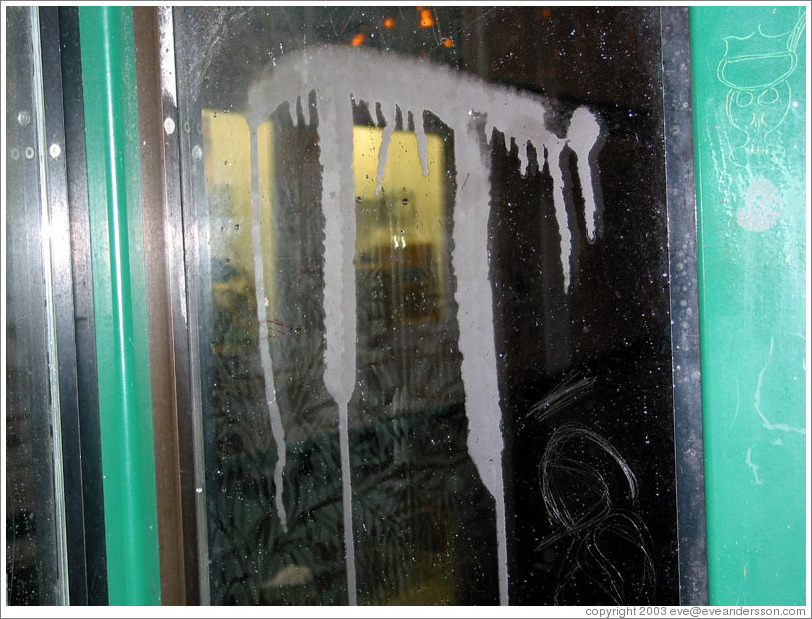 Pi graffiti.  I don't know who created it.  Bus stop.