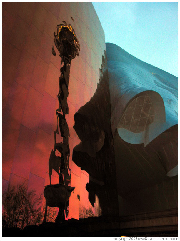 The Space Needle's reflection in the Experience Music Project building.