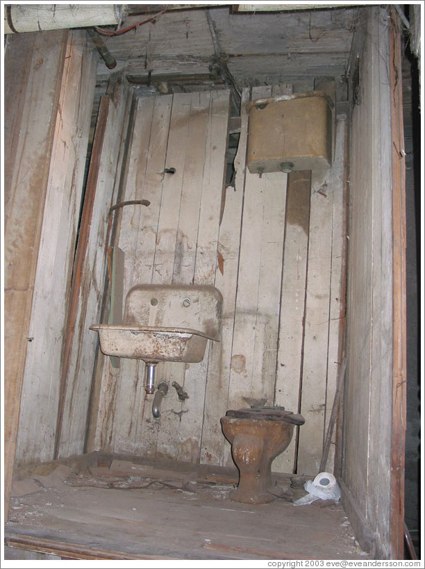 Seattle Underground Tour.  Old bathroom.  Note the height of the tank.