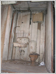 Seattle Underground Tour.  Old bathroom.  Note the height of the tank.