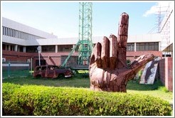 Sculpture depicting a hand pointing upward, the MMD party symbol, outside the Lusaka National Museum.