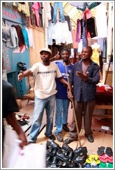 Vendors, annoyed at passersby for getting between the camera and them.  Soweto Market.